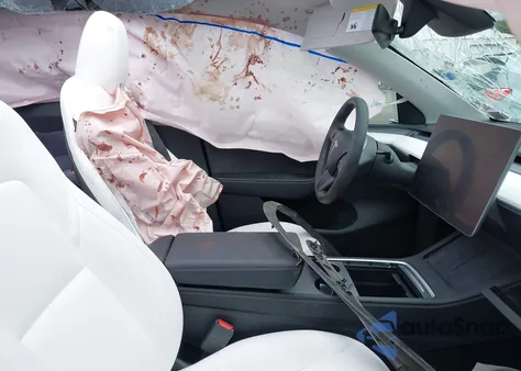 2023 Tesla Model Y from USA, damaged, VIN 7SAYGAEE9PF846733